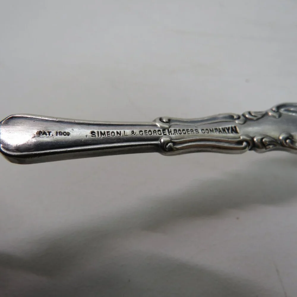 Webster Twisted Handle Butter Knife silver plated S.L. & G.H. Rogers Company A1